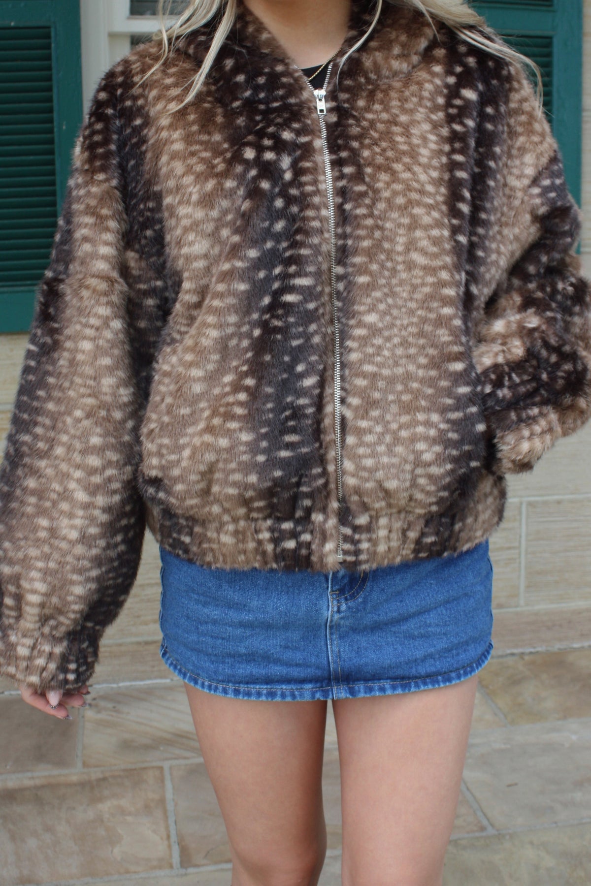 Brown spotted faux fur zip-up jacket with a collared neckline